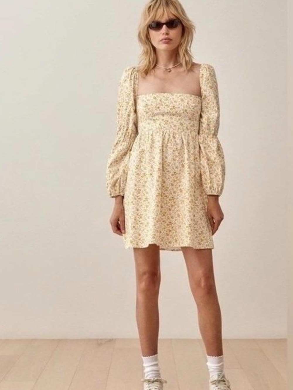 Reformation Michaela babydoll mini dress in a yellow floral "Lima" print
